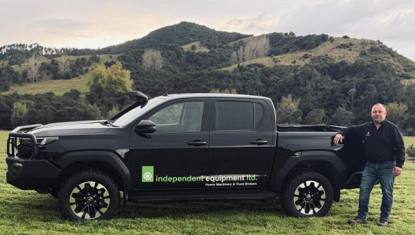 Independent Equipment heavy machinery broker beside company vehicle in New Zealand